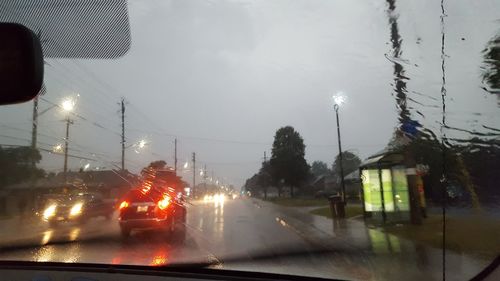 Cars on road at night