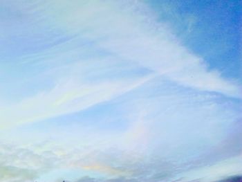 Low angle view of rainbow in sky