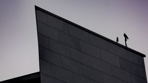 Low angle view of building against clear sky