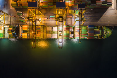 Reflection of illuminated buildings on water at night