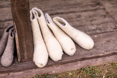 Close-up of shoes on wood