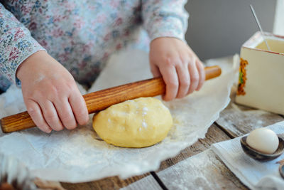Close-up of person baking