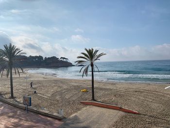 Scenic view of beach against sky