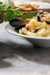 High angle view of pasta in plate on table