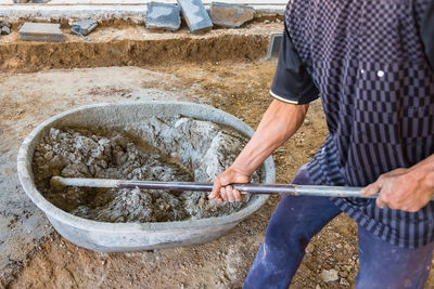 High angle view of man working in water