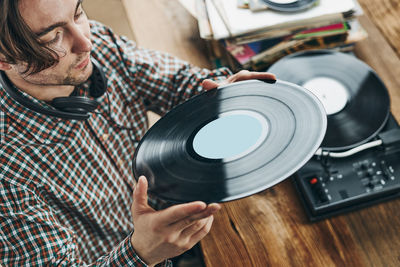 Playing music from record. vinyl record. retro music. vintage style. stereo set. listen to music