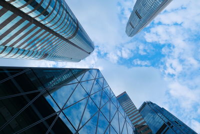 Low angle view of modern buildings against sky