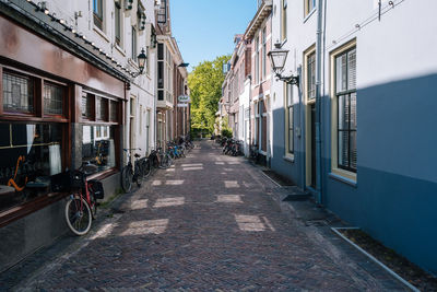 Street amidst buildings against sky