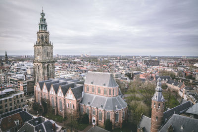 High angle view of illuminated cityscape against sky