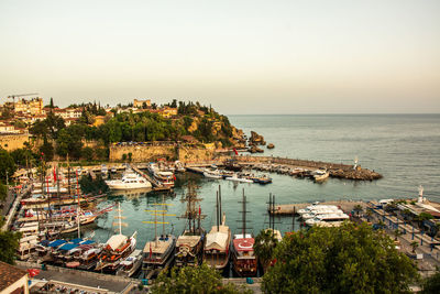 High angle view of harbor by buildings in city