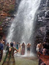 Group of people enjoying in water