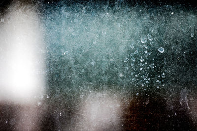 Close-up of snowflakes on glass