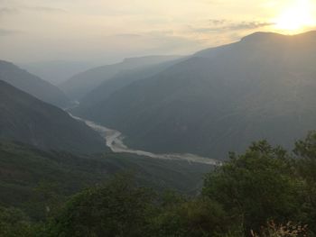 Scenic view of mountains against sky