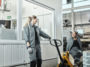 Industry, women using pallet jack