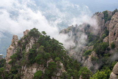 Scenic view of rocky mountains against sky