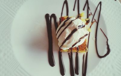 Directly above shot of ice cream in plate on table