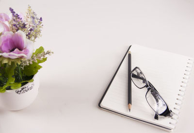 High angle view of flower in vase on table