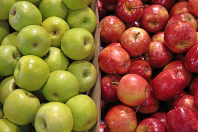 High angle view of red and green apples at market