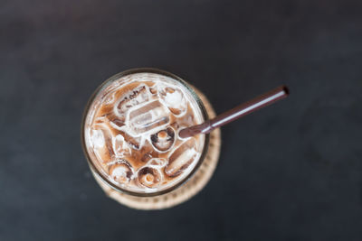 Iced coffee on black background