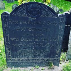 Close-up of text on stone at cemetery