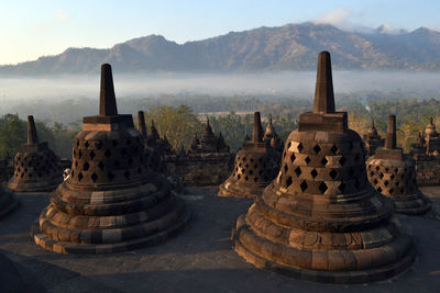 Ancient temple against building