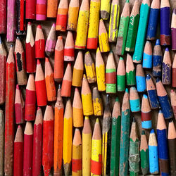 Full frame shot of multi colored pencils on table