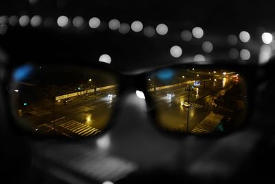 Close-up of illuminated lights at night