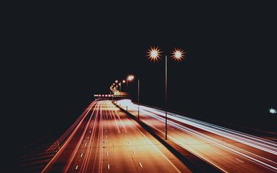 Long exposure of vehicles on road at night