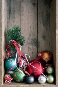 Close-up of colorful baubles on shelf