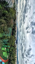 Scenic view of landscape against cloudy sky