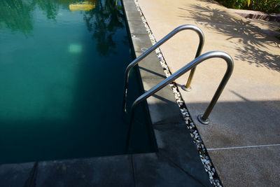High angle view of railing on poolside