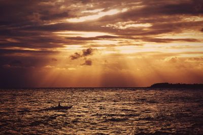 Scenic view of sea at sunset