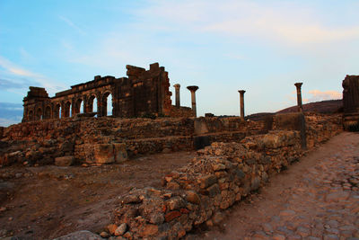 Old ruin building against cloudy sky