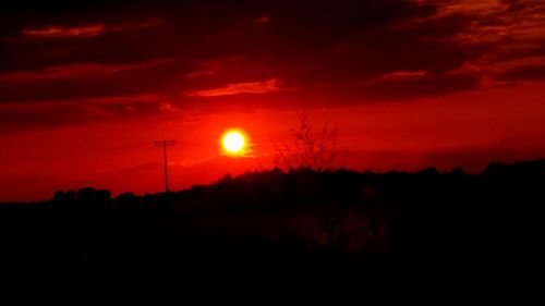 Scenic view of silhouette landscape against sky during sunset