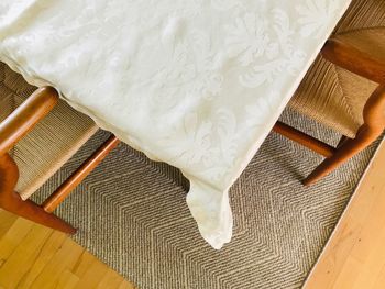 High angle view of chair on table at home
