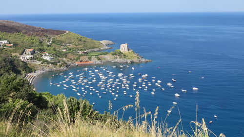 High angle view of town by sea