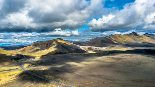 Panoramic view of landscape and mountains against sky