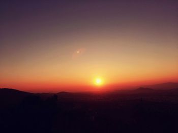 Scenic view of mountains at sunset