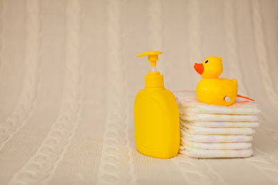 Close-up of yellow toys on table