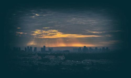 View of cityscape at sunset