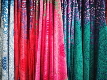 Full frame shot of colorful fabrics for sale at store