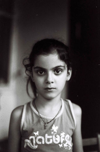 PORTRAIT OF YOUNG WOMAN WITH EYES