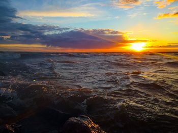 Scenic view of sea against sky during sunset