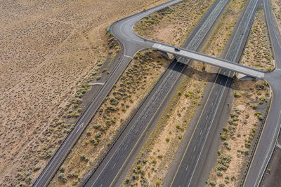 High angle view of railroad tracks on road in city