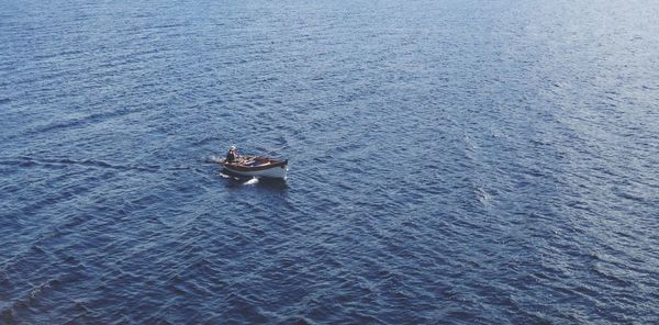 Boats sailing in sea