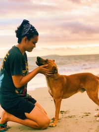 Side view of a dog on beach