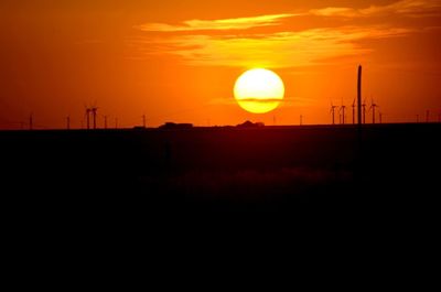 Scenic view of landscape at sunset