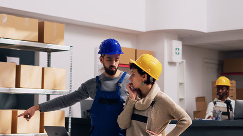 Side view of man working at construction site