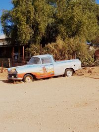 Abandoned car on road