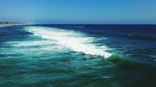 Scenic view of sea against clear sky